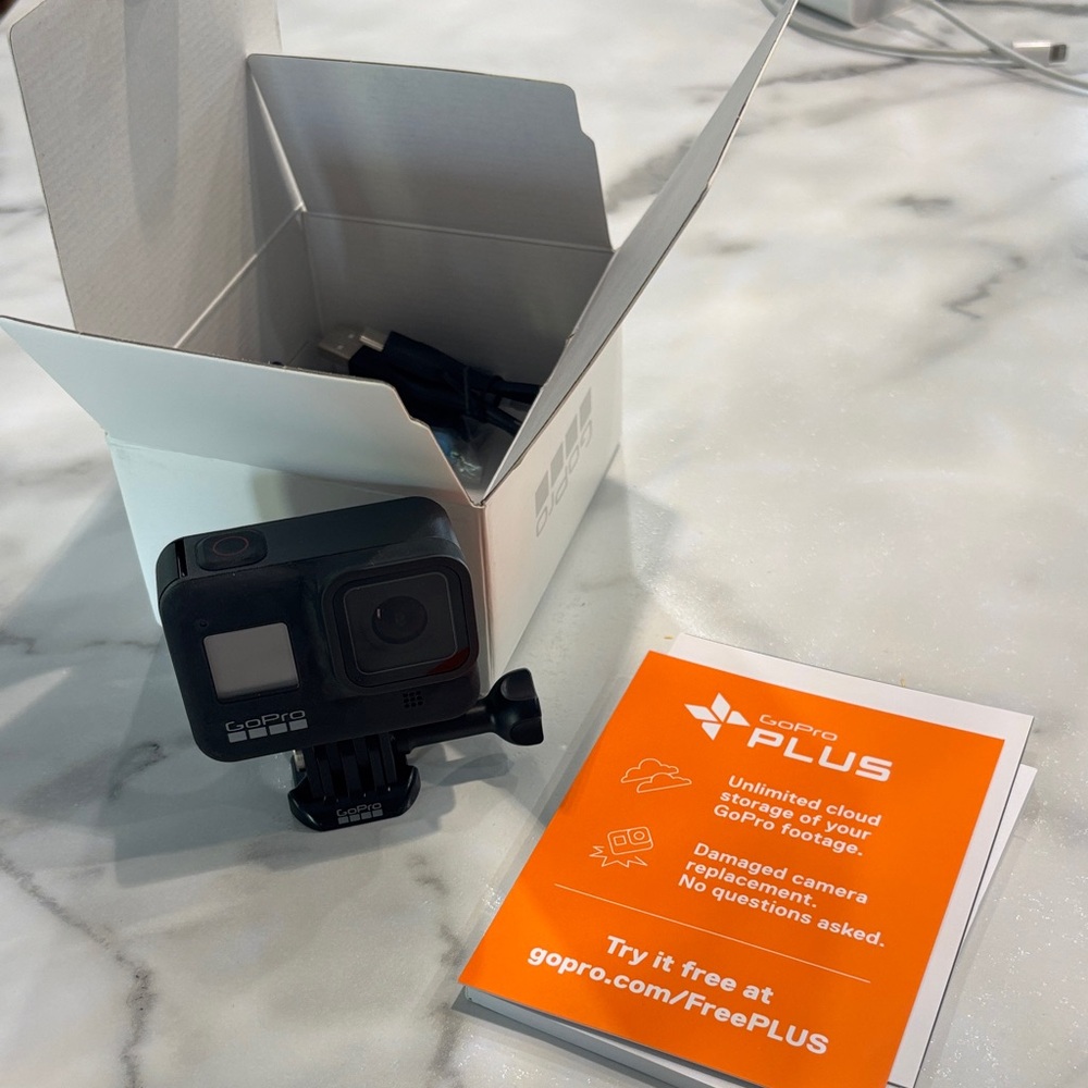 GoPro plus Hero Black Camera